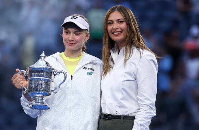 US Open tennis tournament - Day 14 Elena Rybakina (L) of Kazakhstan poses with the Champions trophy after winning the Women’s Singles Finals of the US Open Tennis Championships in Flushing Meadows, New York, USA, 12 September 2026. FLUSHING MEADOWS NEW YORK United States  Copyright: xSARAHxYENESELx