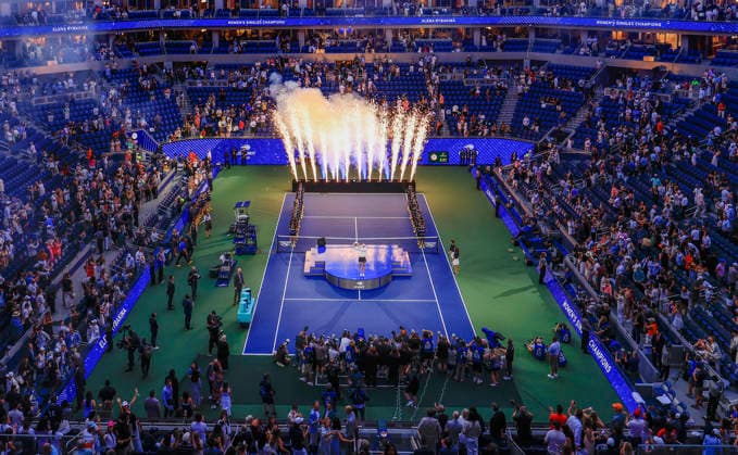 Elena Rybakina of Kazakhstan raises her trophy as fireworks go off after defeating Aryna Sabalenka of Belarus to win their Women s Finals match in Arthur Ashe Stadium at the 2026 US Open Tennis Championship at the USTA Billie Jean King National Tennis Center in New York City on Saturday, September 12, 2026. Rybakina won with a score of 6-4, 5-7, 6-2.  NYP20260912880 COREYxSIPKIN