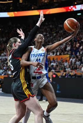 (260913) -- BERLIN, Sept. 13, 2026 -- Valeriane Ayayi (R) of France goes for a layup during the semifinal match between France and Germany at the FIBA Women s Basketball World Cup 2026 in Berlin, Germany, Sept. 12, 2026. ) (SP)GERMANY-BERLIN-BASKETBALL-WOMEN S WORLD CUP-SEMIFINAL-FRA VS GER ZhangxHaofu 