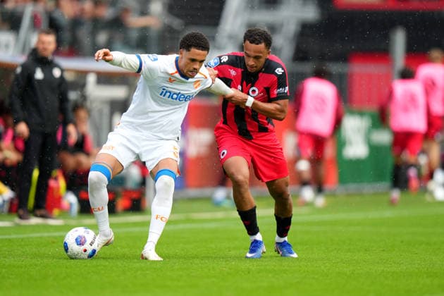 Eredivisie: Excelsior Rotterdam v FC Utrecht Rotterdam - Adrian Blake of FC Utrecht battles for possession with Eric Da Silva Moreira of Excelsior Rotterdam during the sixth competition round of the 2026 2027 Eredivisie season. The match is set between Excelsior Rotterdam and FC Utrecht at Stadion Woudestein on 13 September 2026 in Rotterdam, Netherlands. (Hero Images Nick Koole) Copyright: xNickxKoolex