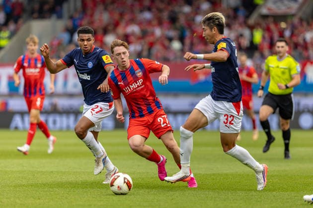 Zweikampf Michael Heule (1.FC Heidenheim, 27) Ikem Ugoh (Holstein Kiel, 27) Hiroki Sekine (Holstein Kiel, 32), GER, 1.FC Heidenheim vs. Holstein Kiel, Fussball, 2. Bundesliga, 05. Spieltag, Spielzeit 2026 2027, 13.09.2026, DFL DFB REGULATIONS PROHIBIT ANY USE OF PHOTOGRAPHS AS IMAGE SEQUENCES AND OR QUASI-VIDEO, GER, 1.FC Heidenheim vs. Holstein Kiel, Fussball, 2. Bundesliga, 05. Spieltag, Spielzeit 2026 2027, 13.09.2026 Heidenheim Copyright: xEibner-Pressefoto JanixPlessx EP_JPL