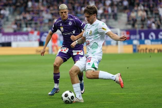 13.09.2026 - SOCCER - 2026 27 ADMIRAL BUNDESLIGA,Round 6 FK Austria Wien vs Austria Lustenau Vasilije Markovic (Austria Wien) and Dominik Weixelbraun (Austria Lustenau) in one-on-one VIENNA VIENNA, AUSTRIA Generali Arena FK Austria Wien Generali Arena AUSTRIA Copyright: xYigitxOermexYigitxOermex