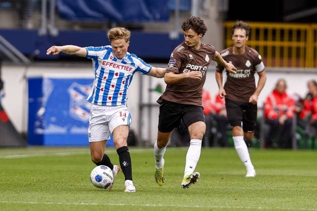 HEERENVEEN , 13-09-2026 , Abe Lenstra Stadium , season 2026 2027 , Dutch Eredivisie football . match between SC Heerenveen and Telstar, Picture shows sc Heerenveen player Levi Smans Telstar player Nils Rossen Heerenveen - Telstar  x206988389x Copyright: