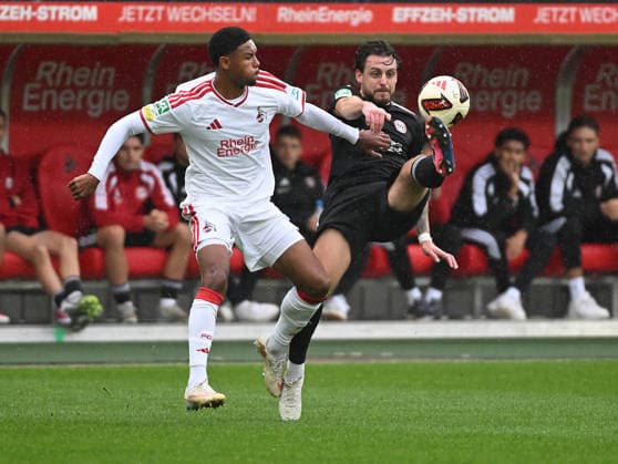 13.09.2026, xophax, Fussball Regionalliga West 26 27 1.FC Köln U23 gegen SV Bergisch Gladbach . Maik Afri Akumu ( 1.FC Köln ), links und Maik Marquardt , rechts ( Bergisch Gladbach ) (DFL DFB REGULATIONS PROHIBIT ANY USE OF PHOTOGRAPHS as IMAGE SEQUENCES and or QUASI-VIDEO) Koeln