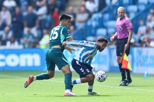 Jay Dasilva of Coventry City battles with Diego Gomez of Brighton & Hove Albion Coventry City v Brighton and Hove Albion, Premier League, Football, Football, Coventry Building Society Arena, Coventry, UK - 13 Sep 2026Coventry Coventry Building Society Arena United Kingdom EDITORIAL USE ONLY No use with unauthorised audio, video, data, fixture lists, club league logos or live services. Online in-match use limited to 120 images, no video emulation. No use in betting, games or single club league player publications. Copyright: xMichaelxZemanek Shutterstockx 17144597aj