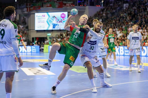 13.09.2026, xgox, Handball - Opel HBL SC Magdeburg - HSG Wetzlar emspor, v.l. Magnus Saugstrup (Magdeburg, 23) wirft Tor, Torschuetze, erzielt Tor, Treffer, scores the goal Magdeburg