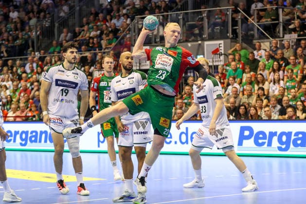 13.09.2026, xgox, Handball - Opel HBL SC Magdeburg - HSG Wetzlar emspor, v.l. Magnus Saugstrup (Magdeburg, 23) wirft Tor, Torschuetze, erzielt Tor, Treffer, scores the goal Magdeburg