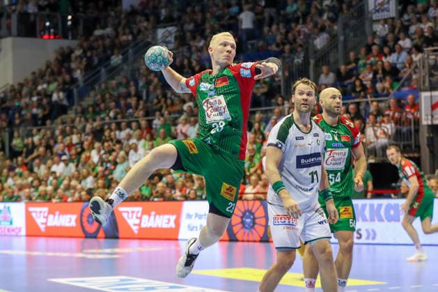 13.09.2026, xgox, Handball - Opel HBL SC Magdeburg - HSG Wetzlar emspor, v.l. Magnus Saugstrup (Magdeburg, 23) wirft Tor, Torschuetze, erzielt Tor, Treffer, scores the goal Magdeburg