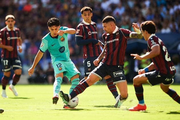 Xavi Espart FC Barcelona, Barca and Adrian de la Fuente, Dela (Levante UD) during the LaLiga EA Sports match between Levante UD and FC Barcelona at Estadi Ciutat de Valencia on September 13, 2026 in Valencia, Spain. -