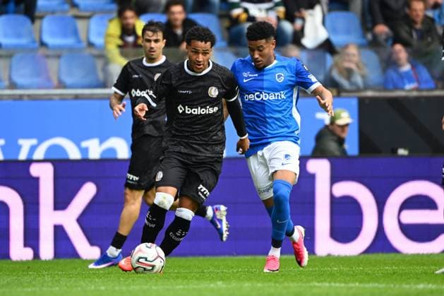 KRC Genk v KAA Gent - Jupiler Pro League GENK, BELGIUM - SEPTEMBER 13 : Sonko Momodou forward of KAA Gent, Amaro Kevin defender of KRC Genk during the Jupiler Pro League match between KRC Genk and KAA Gent on September 13, 2026 in Genk, Belgium, 13 09 2026 Genk Belgium  Copyright: xVincentxKalutx