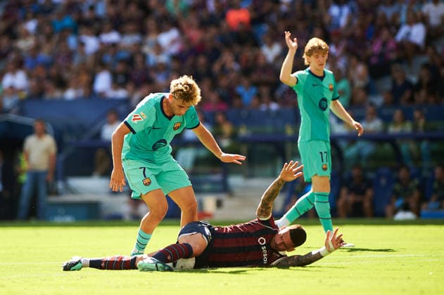 Fermin Lopez FC Barcelona, Barca and Adrian de la Fuente, Dela (Levante UD) during the LaLiga EA Sports match between Levante UD and FC Barcelona at Estadi Ciutat de Valencia on September 13, 2026 in Valencia, Spain. -