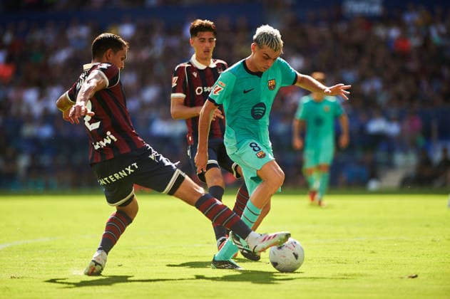 Aissa Mandi (Levante UD) and Pedri Gonzalez FC Barcelona, Barca during the LaLiga EA Sports match between Levante UD and FC Barcelona at Estadi Ciutat de Valencia on September 13, 2026 in Valencia, Spain. -