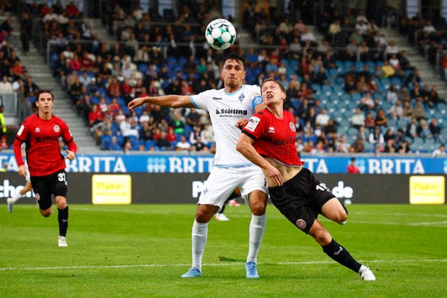 13.09.2026, xavx, Fussball 3.Liga, SV Wehen Wiesbaden - SV Waldhof Mannheim v.l. Fabian Greilinger (SV Wehen Wiesbaden), Claudio Kammerknecht (SV Waldhof Mannheim) Wiesbaden
