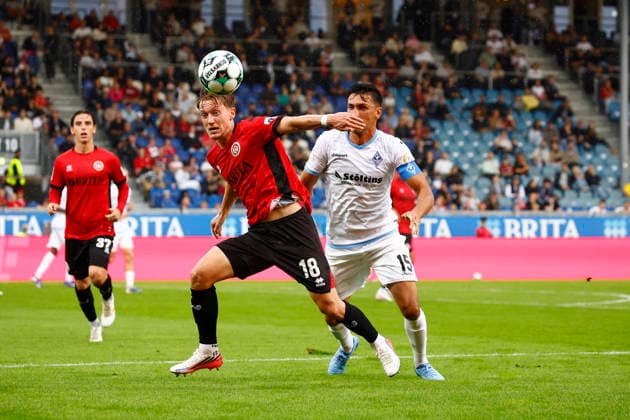 13.09.2026, xavx, Fussball 3.Liga, SV Wehen Wiesbaden - SV Waldhof Mannheim v.l. Fabian Greilinger (SV Wehen Wiesbaden), Claudio Kammerknecht (SV Waldhof Mannheim) Wiesbaden