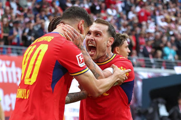 1. Fußball Bundesliga: RB Leipzig - Hamburger SV; 13.09.2026 Kapitän David Raum (22, RB Leipzig) mit emotionalem Jubel über das Tor von Romulo Cardoso da Cruz (40, RB Leipzig). LEIPZIG, DEUTSCHLAND - SEPTEMBER 13: Bundesliga-Spiel RB Leipzig - Hamburger SV in der Red Bull Arena am 3. Spieltag der 1. Bundesliga am September 13, 2026 in Leipzig, Deutschland. DFL REGULATIONS PROHIBIT ANY USE OF PHOTOGRAPHS AS IMAGE SEQUENCES AND OR QUASI-VIDEO. Copyright: xBEAUTIFULxSPORTS JanxKaeferx