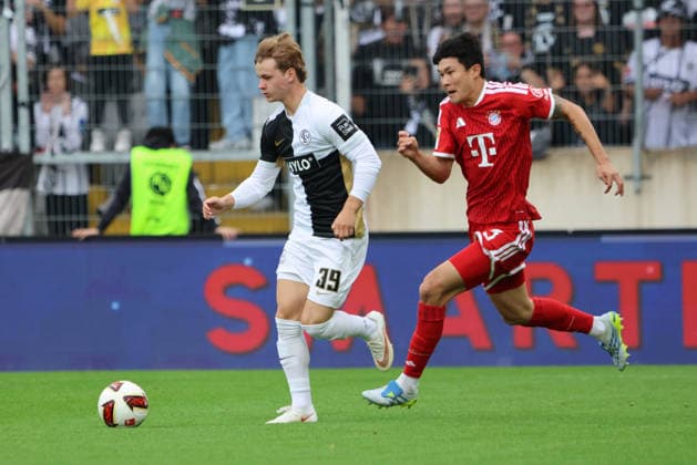 13.09.2026, Fussball, Herren, 1. Bundesliga, Saison 2026 2027, SV 07 Elversberg - FC Bayern München, Cole Campbell (SV 07 Elversberg), Minjae Kim (FC Bayern München) Elversberg Ursapharm-Arena an der Kaiserlinde Saarland Deutschland (DEU) Copyright: xFabianxKleerx