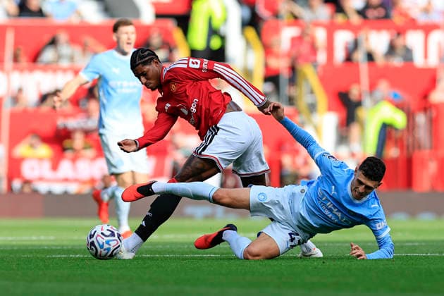 Manchester United, ManU v Manchester City, Premier League Marcus Rashford (9) of Manchester United and Phil Foden (47) of Manchester City challenge for the ball during the Premier League match between Manchester United and Manchester City at Old Trafford, Manchester, UK on 13 September 2026. Manchester Old Trafford Greater Manchester UK Editorial use only DataCo restrictions apply See www.football-dataco.com , Copyright: xConorxMolloyx PSI-24872-0024