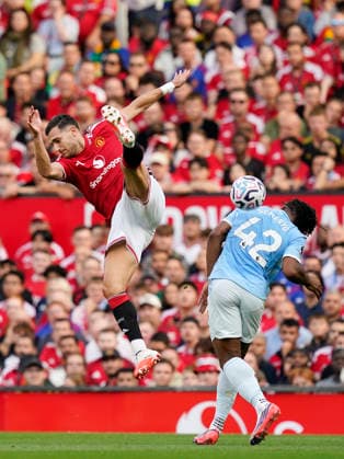 Manchester, England, 13th September 2026. Diogo Dalot of Manchester United, ManU with Antoine Semenyo of Manchester City during the Manchester United vs Manchester City Premier League match at Old Trafford, Manchester. Picture credit should read: Andrew Yates Sportimage EDITORIAL USE ONLY. No use with unauthorised audio, video, data, fixture lists, club league logos or live services. Online in-match use limited to 120 images, no video emulation. No use in betting, games or single club league player publications. SPI_034_AY_MAN_UTD_MAN_CITY SPI-4993-0035
