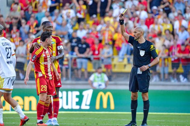 FOOTBALL : Le Mans FC vs RC Lens - Ligue 1 - JournÃ e 4- 13 09 2026 Hakim Ben El Hadj (Arbitre Central) Lucas Bretelle (Le Mans FC) Le MansFrance  Copyright: xBaptistexAutissierx