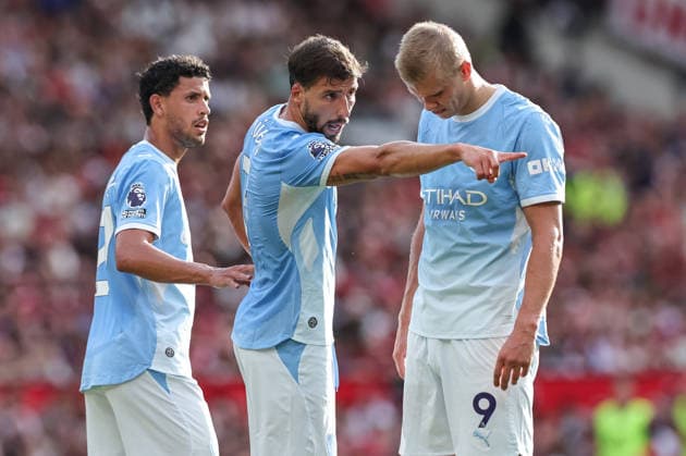 Premier League: Manchester United, ManU v Manchester City Ruben Dias of Manchester City speaks with Matheus Nunes of Manchester City and Erling Haaland of Manchester City during the Premier League match Manchester United vs Manchester City at Old Trafford, Manchester, United Kingdom on 13 September 2026 (Photo by Mark Cosgrove News Images) Manchester Old Trafford Greater Manchester United Kingdom Copyright: xMarkxCosgrove NewsxImagesx