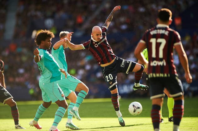 Oriol Rey (Levante UD) and Karim Adeyemi FC Barcelona, Barca during the LaLiga EA Sports match between Levante UD and FC Barcelona at Estadi Ciutat de Valencia on September 13, 2026 in Valencia, Spain. -