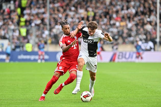1. Fussball Bundesliga: SV Elversberg - FC Bayern Muenchen, 13.09.2026 ELVERSBERG, GERMANY; 13. SEPTEMBER: im Duell Michael OLISE (FC Bayern Munich 17) und Maurice KRATTENMACHER (SV Elversberg 7) während dem Match der Bundesliga zwischen der SV Elversberg und dem FC Bayern München am 3. Spieltag in der Ursapharm-Arena an der Kaiserlinde DFL REGULATIONS PROHIBIT ANY USE OF PHOTOGRAPHS AS IMAGE SEQUENCES AND OR QUASI-VIDEO Copyright: xBEAUTIFULxSPORTS Goldbergx