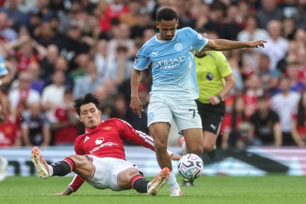Premier League: Manchester United, ManU v Manchester City Lisandro Martinez of Manchester United and Iliman Ndiaye of Manchester City battle for the ball during the Premier League match Manchester United vs Manchester City at Old Trafford, Manchester, United Kingdom on 13 September 2026 (Photo by Mark Cosgrove News Images) Manchester Old Trafford Greater Manchester United Kingdom Copyright: xMarkxCosgrove NewsxImagesx