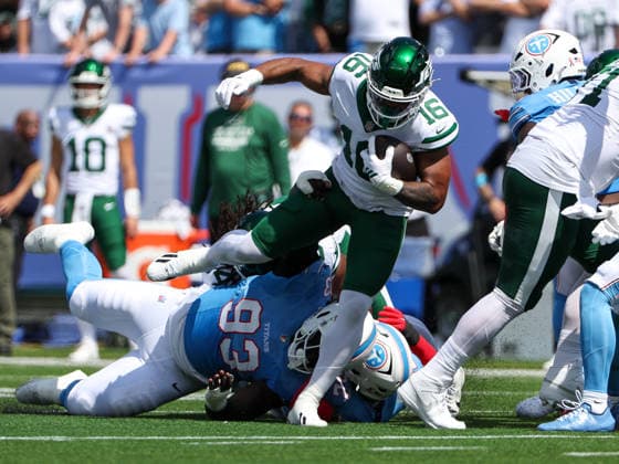 Sep 13, 2026; Nashville, TN, USA; New York Jets tight end Kenyon Sadiq (16) is tripped up by Tennessee Titans defensive tackle Nazir Stackhouse (93) during the NFL, American Football Herren, USA regular season game between the New York Jets and Tennessee Titans at Nissan Stadium. Mandatory Credit: -Cal Media Nashville USA - ZUMAc04_ 20260913_zma_c04_053 Copyright: xStephenxFurstx