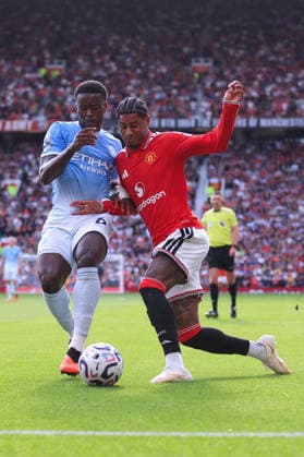 Football - Premier League - Manchester United, ManU v Manchester City 13th September 2026 - Premier League - Manchester United v Manchester City - Marc Guehi of Manchester City battles with Marcus Rashford of Manchester United - Photo: Simon Stacpoole Offside. Manchester UK Copyright: xSimonxStacpoolexOffside