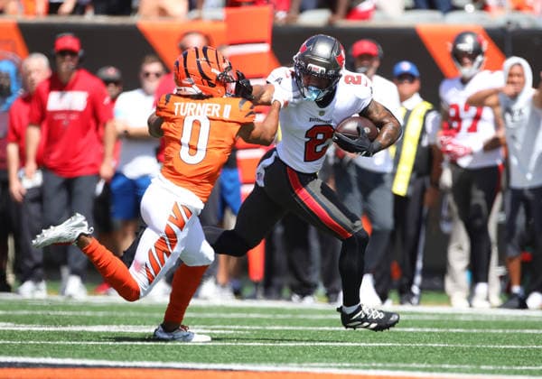 CINCINNATI, OH - SEPTEMBER 13: Tampa Bay Buccaneers wide receiver Emeka Egbuka 2 is pursued by Cincinnati Bengals cornerback DJ Turner II 0 in a game between the Tampa Bay Buccaneers and the Cincinnati Bengals on September 13, 2026, at Paycor Stadium in Cincinnati, OH. (Photo by Jeff Moreland Icon Sportswire) NFL, American Football Herren, USA SEP 13 Buccaneers at Bengals EDITORIAL USE ONLY Icon168260913006