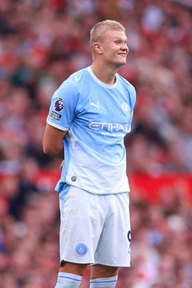 Football - Premier League - Manchester United, ManU v Manchester City 13th September 2026 - Premier League - Manchester United v Manchester City - Erling Haaland of Manchester City smiles as he awaits the Video Assistant Referee (VAR) decision to award his goal - Photo: Simon Stacpoole Offside. Manchester UK Copyright: xSimonxStacpoolexOffside