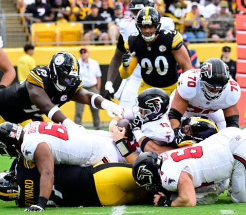 Pittsburgh Steelers linebacker Alex Highsmith (56) sacks Atlanta Falcons quarterback Cooper Rush (13) for a lost of seven yards against the Atlanta Falcons at Acrisure Stadium on Sunday, Sept. 13, 2026 in Pittsburgh.  PIT2026091305 ARCHIExCARPENTER