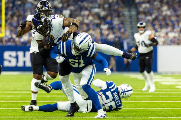 Sep 13, 2026; Indianapolis, IN, USA; Baltimore Ravens running back Derrick Henry (22) runs with the ball as Indianapolis Colts linebacker Akeem Davis-Gaither (51) pursues during NFL, American Football Herren, USA game action at Lucas Oil Stadium. Mandatory Credit: -Cal Media Indianapolis USA - ZUMAc04_ 20260913_zma_c04_134 Copyright: xJohnxMersitsx
