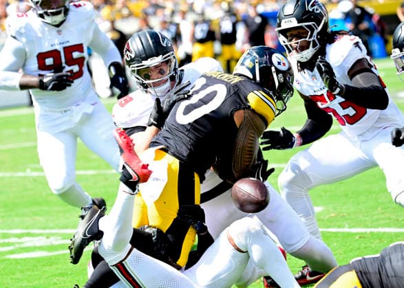 Pittsburgh Steelers running back Jaylen Warren (30) fumbles in the first quarter and the Atlanta Falcons recovers the ball at Acrisure Stadium on Sunday, Sept. 13, 2026 in Pittsburgh.  PIT2026091310 ARCHIExCARPENTER