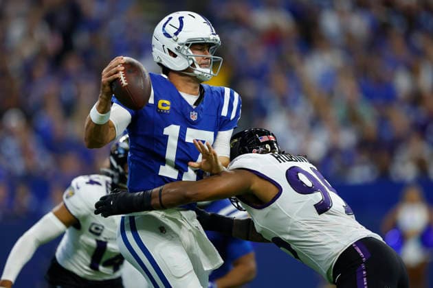 INDIANAPOLIS, IN - SEPTEMBER 13: Indianapolis Colts quarterback Daniel Jones (17) is hit by Baltimore Ravens defensive tackle Rayshaun Benny (99) in the first quarter of play during a NFL, American Football Herren, USA game between the Baltimore Ravens and the Indianapolis Colts on September 13, 2026 at Lucas Oil Stadium in Indianapolis, IN. (Photo by Jeffrey Brown Icon Sportswire) NFL: SEP 13 Ravens at Colts EDITORIAL USE ONLY Icon091326014