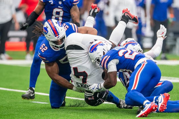 September 13, 2026: Houston Texans running back Woody Marks (4) is tackled by Buffalo Bills cornerback Dee Alford (23) and Buffalo Bills linebacker Kaleb Elarms-Orr (52) during a game between the Buffalo Bills and the Houston Texans in Houston, TX. .. CSM - ZUMAc04_ 20260913_zma_c04_083 Copyright: xTraskxSmithx