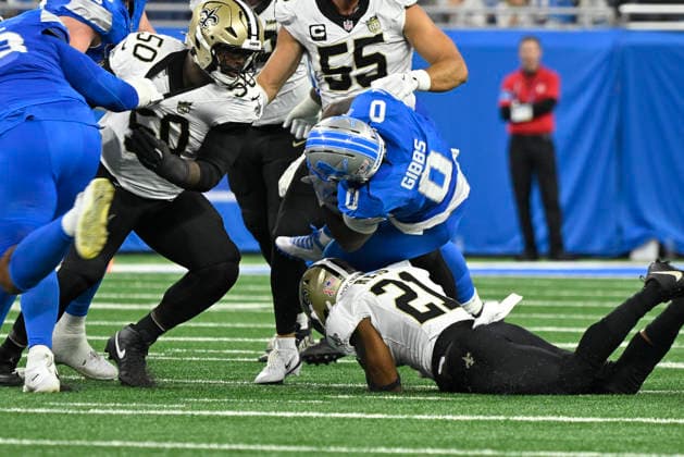 Sep 13, 2026; Detroit, MI, USA; Detroit Lions running back Jahmyr Gibbs (0) gets upended at Ford Field. Mandatory Credit: -Cal Media NFL, American Football Herren, USA 2026: Saints Vs Lions SEP 13  - ZUMAc04_ 20260913_zma_c04_139 Copyright: xAllanxDranbergx