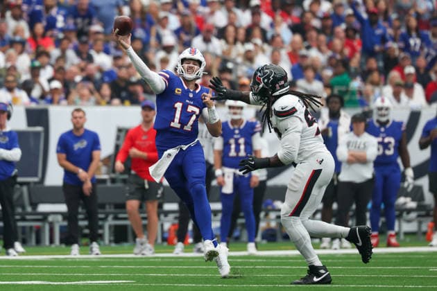 HOUSTON, TX - SEPTEMBER 13: Quarterback Josh Allen 17 of the Buffalo Bills throws the ball while on the run as he is pressured by defensive end Jadeveon Clowney 90 of the Houston Texans during the NFL, American Football Herren, USA game between the Houston Texans and the Buffalo Bills on September 13, 2026, at Reliant Stadium in Houston, TX.(Photo by David Buono Icon Sportswire) NFL: SEP 13 Bills at Texans EDITORIAL USE ONLY Icon260913026
