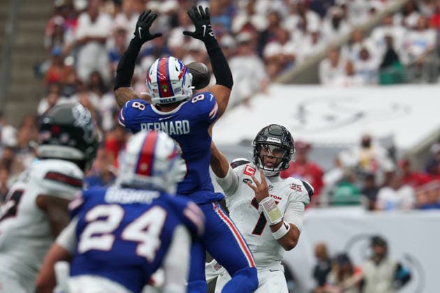 HOUSTON, TX - SEPTEMBER 13: Quarterback C.J. Stroud 7 of the Houston Texans passes the ball as linebacker Terrel Bernard 8 of the Buffalo Bills leaps for a block attempt during the NFL, American Football Herren, USA game between the Houston Texans and the Buffalo Bills on September 13, 2026, at Reliant Stadium in Houston, TX.(Photo by David Buono Icon Sportswire) NFL: SEP 13 Bills at Texans EDITORIAL USE ONLY Icon260913030