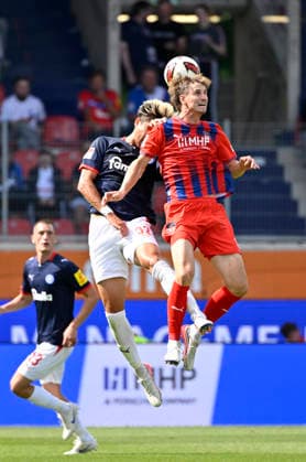 Kopfballduell Zweikampf Aktion Hiroki Sekine Holstein Kiel (32) gegen Jan Schoeppner 1. FC Heidenheim 1846 FCH (03) 1. FC Heidenheim 1846 FCH vs Holstein Kiel KSV 13.09.2026 DFL REGULATIONS PROHIBIT ANY USE OF PHOTOGRAPHS AS IMAGE SEQUENCES AND OR QUASI-VIDEO 1. FC Heidenheim 1846 FCH vs Holstein Kiel KSV