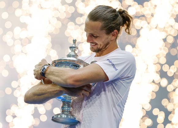 Alexander Zverev of Germany holds the trophy after defeating Ben Shelton to win the Men s Finals match in Arthur Ashe Stadium at the 2026 US Open Tennis Championship at the USTA Billie Jean King National Tennis Center in New York City on Sunday, September 13, 2026. Zverev won 6-3, 7-6, 5-7, 6-2.  NYP20260913883 COREYxSIPKIN