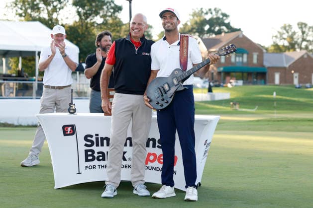 FRANKLIN, TN - SEPTEMBER 13: Alvaro Ortiz of Mexico is presented the championship guitar trophy from Paul Craig of Simmons Bank following his win at the Simmons Bank Open for the Snedeker Foundation, September 13, 2026 at Vanderbilt Legends Club in Franklin, Tennessee. (Photo by Matthew Maxey Icon Sportswire) GOLF: SEP 13 Korn Ferry Tour Simmons Bank Open EDITORIAL USE ONLY Icon260913047