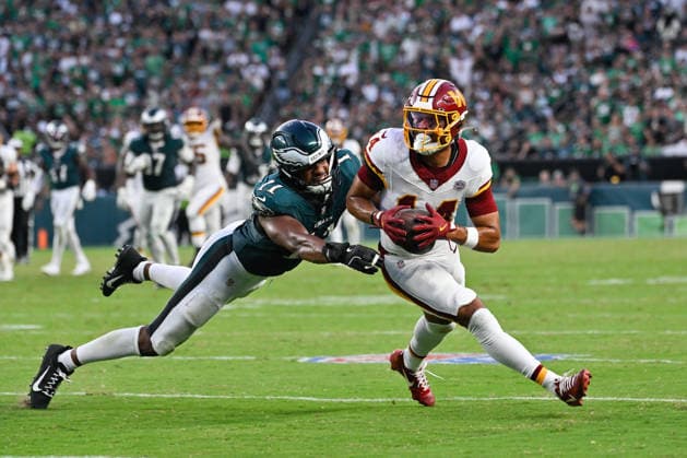September 13, 2026; Philadelphia, Pennsylvania, USA; Philadelphia Eagles linebacker Jihaad Campbell (11) tackles Washington Commanders wide receiver Antonio Williams (14) during the second half at Lincoln Financial Field. Mandatory Credit: -Cal Media NFL, American Football Herren, USA 2026: Commanders Vs Eagles SEP 13  - ZUMAc04_ 20260913_zma_c04_365 Copyright: xEricxCanhax
