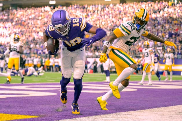 MINNEAPOLIS, MN - SEPTEMBER 13: Minnesota Vikings wide receiver Justin Jefferson (18) catches a pass to complete a 2-point conversion as Green Bay Packers cornerback Keisean Nixon (25) defends during the fourth quarter of a NFL, American Football Herren, USA game between the Minnesota Vikings and Green Bay Packers on September 13, 2026, at U.S. Bank Stadium in Minneapolis MN. (Photo by Nick Wosika Icon Sportswire) NFL: SEP 13 Packers at Vikings EDITORIAL USE ONLY Icon20260913033