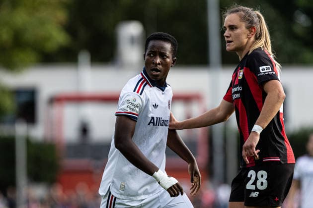 Google Pixel Frauen Bundesliga: Bayer 04 Leverkusen - FC Bayern München;14.09.2026 Kakouan Bernadette Amani (FC Bayern München, 15), Paulina Tomasiak (Bayer 04 Leverkusen, 28) Frauen Bundesliga Google Pixel Frauen Bundesliga 26 27: Bayer 04 Leverkusen - FC Bayern München; Ulrich-Haberland-Stadion, Leverkusen; 14.09.2026 DFL regulations prohibit any use of photographs as image sequences and or quasi video.