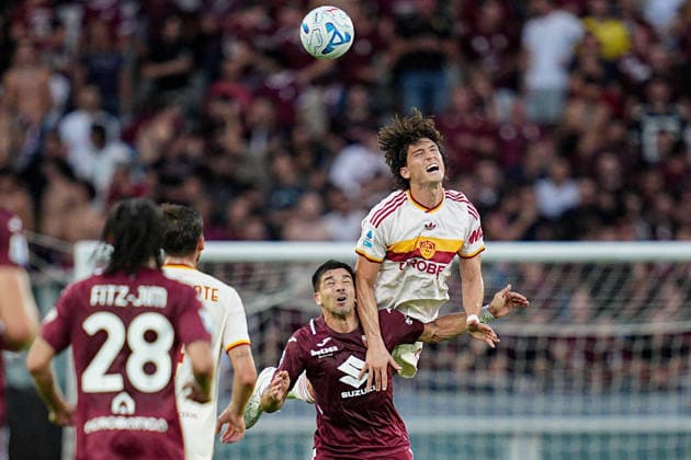RomaÕs Niccolo Pisilli jumps for the ball with Torino s Giovanni Simeone during the Serie A soccer match between Torino and Roma at the Stadio Olimpico Grande Torino in Turin, north west Italy - Sunday, September 14, 2026. - Soccer .  Copyright: xMarcoxAlpozzi LaPressex