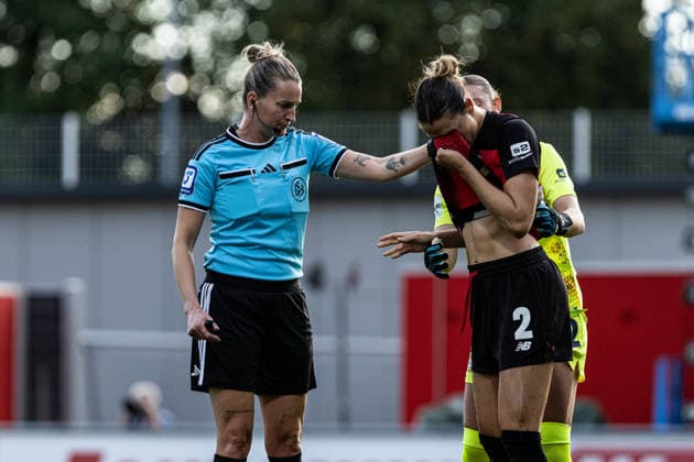 Google Pixel Frauen Bundesliga: Bayer 04 Leverkusen - FC Bayern München;14.09.2026 Selina Ostermeier (Bayer 04 Leverkusen, 2), Rafaela Borggräfe (Bayer 04 Leverkusen, 12), Anna-Lena Heidenreich (Schiedsrichterin) Frauen Bundesliga Google Pixel Frauen Bundesliga 26 27: Bayer 04 Leverkusen - FC Bayern München; Ulrich-Haberland-Stadion, Leverkusen; 14.09.2026 DFL regulations prohibit any use of photographs as image sequences and or quasi video.