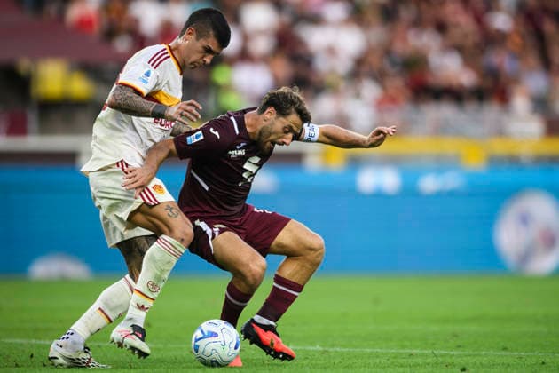 Torino FC v AS Roma - Serie A Nikola Vlasic of Torino FC competes for the ball with Gianluca Mancini of AS Roma during the Serie A football match between Torino FC and AS Roma. Turin Italy Copyright: xNicolòxCampox