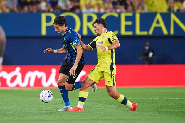 Marc Bartra (Real Betis) and Georges Mikautadze (Villarreal CF) during the LaLiga EA Sports match between Villarreal CF and Real Betis Balompie at Estadio de la Ceramica on September 14, 2026 in Villarreal, Spain. -