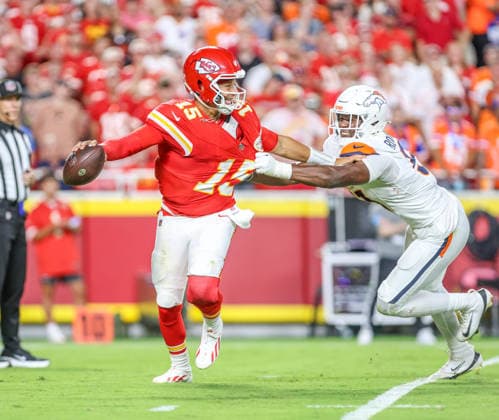 Sep 14, 2026: Kansas City Chiefs quarterback Patrick MahomesÃ‚ (15) tries to get away from Denver Broncos outside linebacker Que Robinson (51) in Kansas City, MO, USA; at Arrowhead Stadium. Mandatory Credit: -Cal Media Kansas City USA - ZUMAc04_ 20260914_zma_c04_105 Copyright: xRomanxPunox